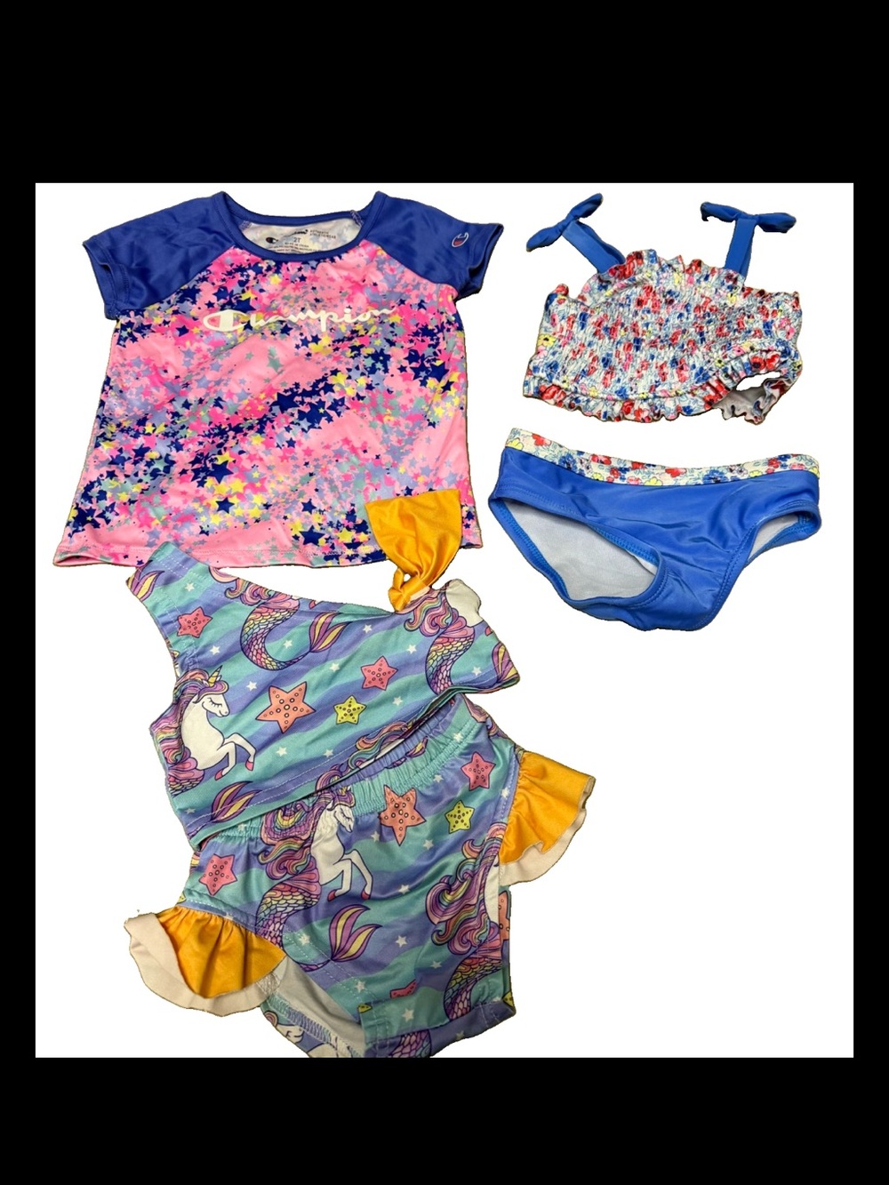 Champion Kids Swim Shirt with two bikinis featuring unicorns and flowers
